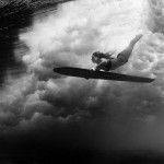 Alison Duck Diving with a Hawaiian-style Surfboard